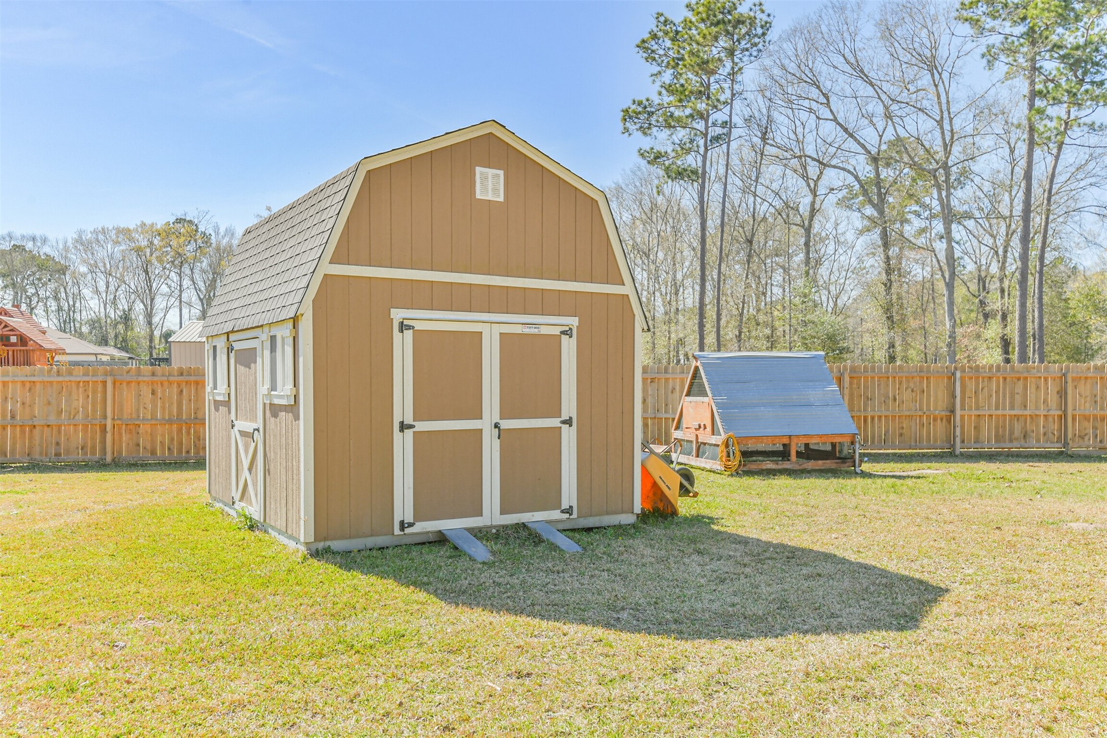 27553 Rio Blanco Drive Splendora, TX 77372 - Photo 38 of 41 a front view of a house with a yard