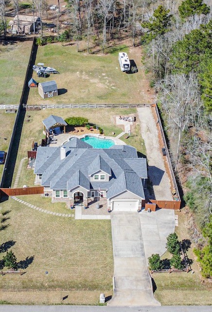 27553 Rio Blanco Drive Splendora, TX 77372 - Photo 40 of 41 an aerial view of a house with a ocean view