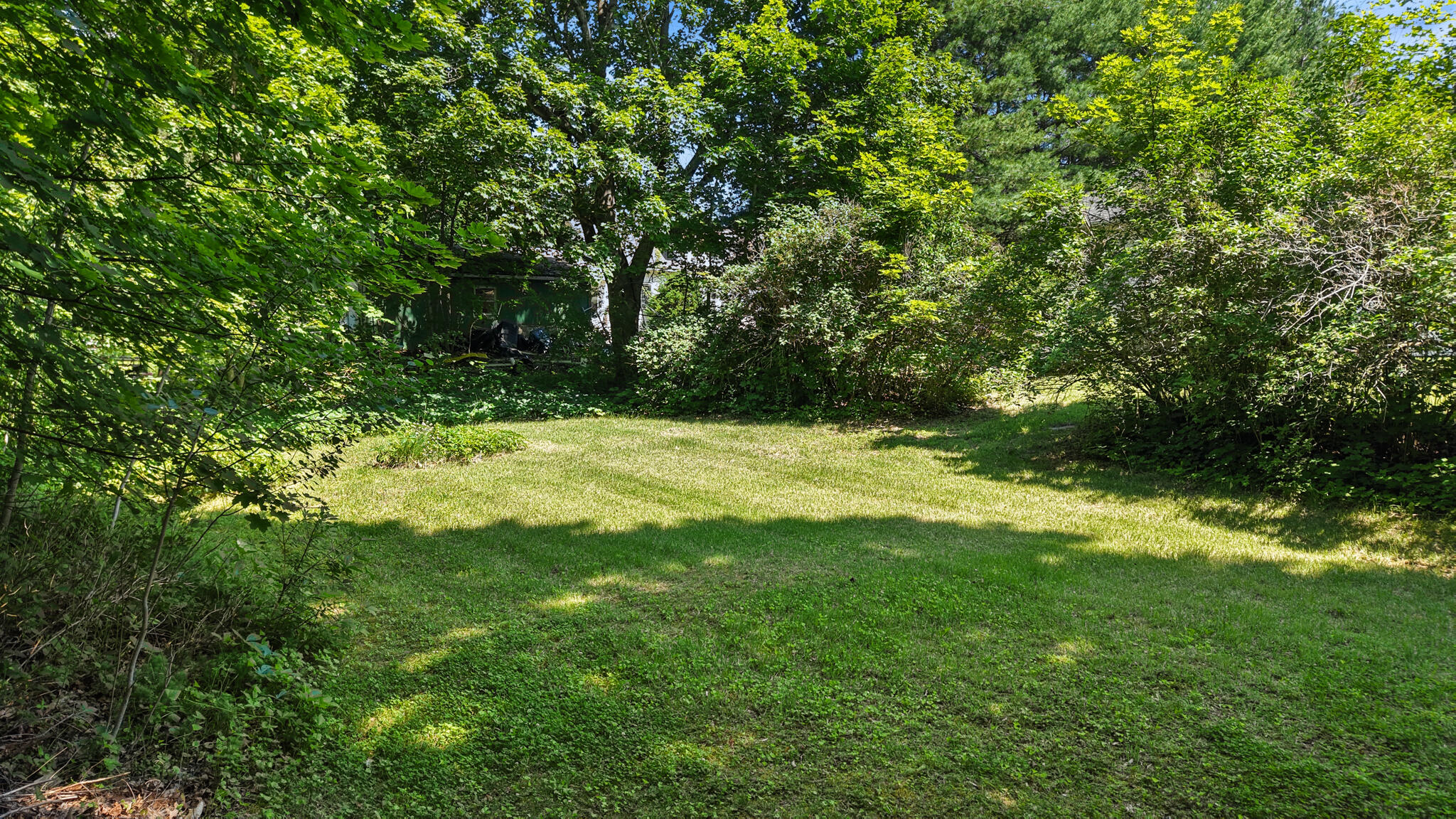 1106 Chase Road Veazie, ME 04401 - Photo 4 of 53 dji_fly_20260703_104122_0748_17830903968
