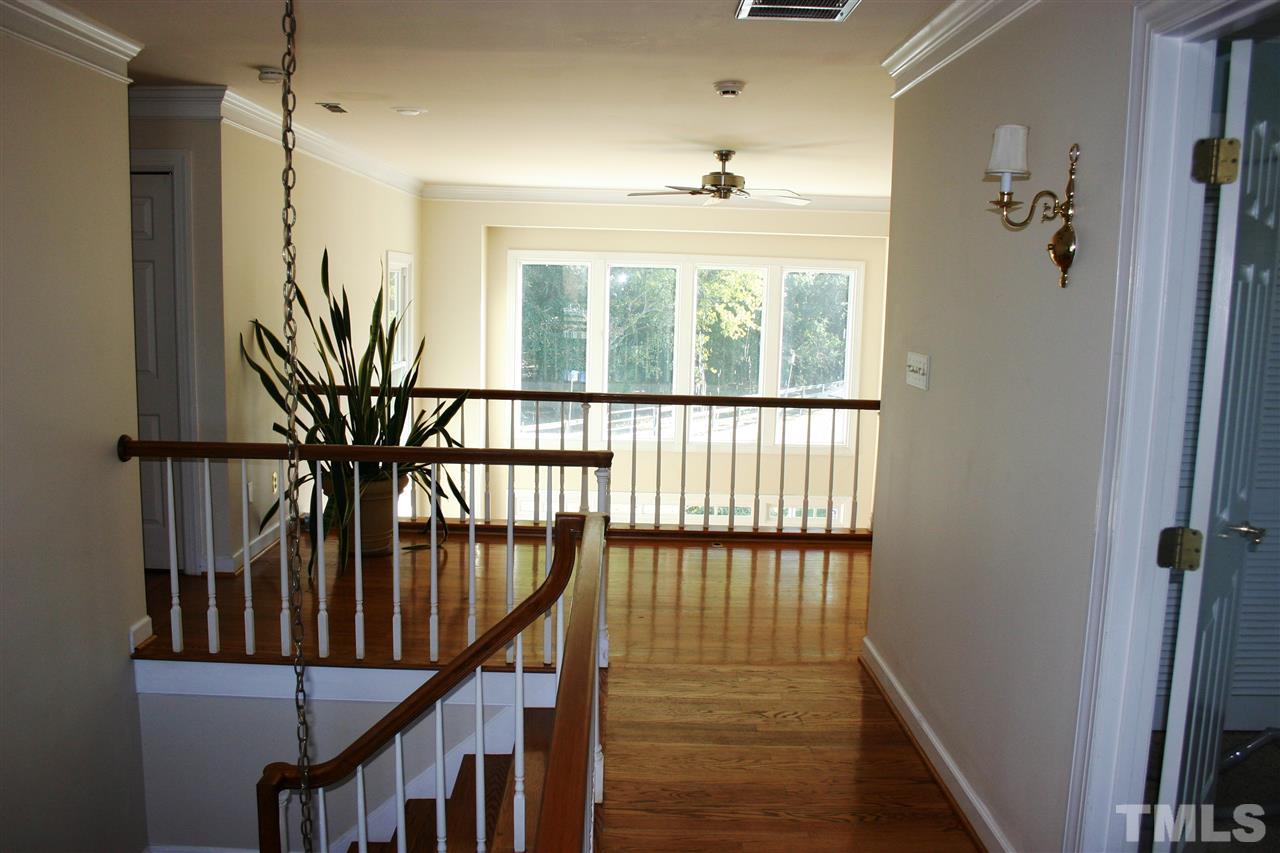 307 Bacon Road Rougemont, NC 27572 - Photo 12 of 25 a view of entryway with wooden floor and stairs