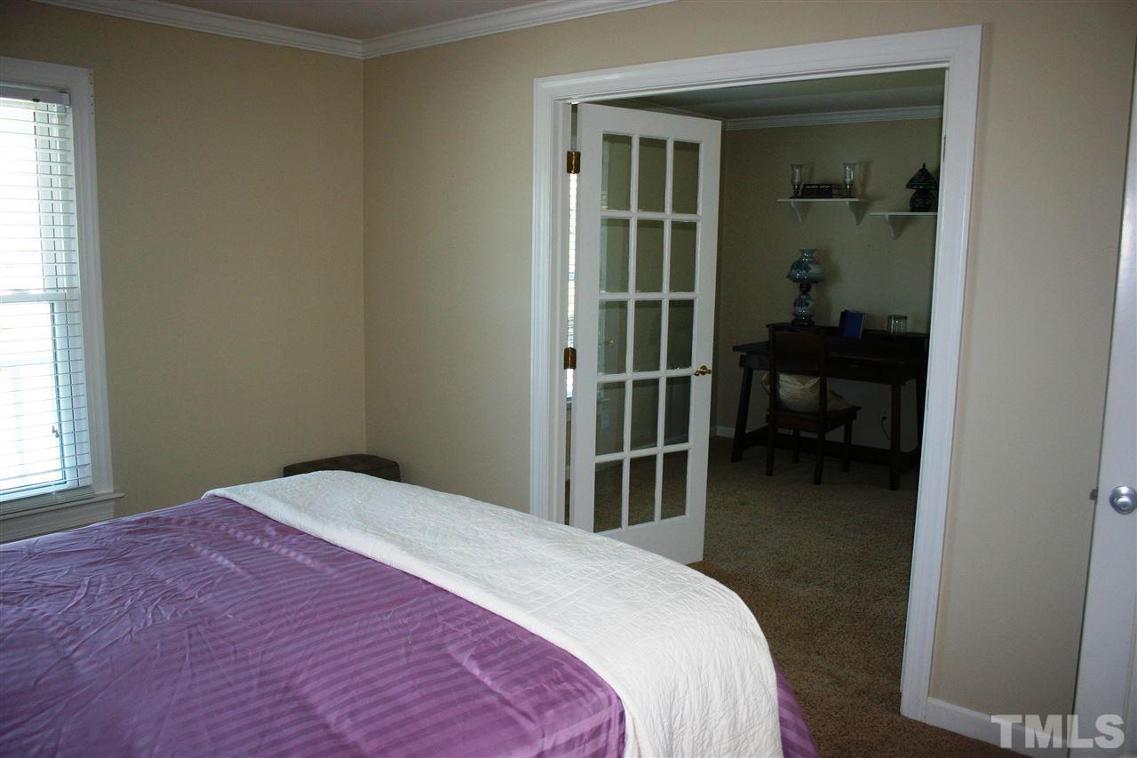 307 Bacon Road Rougemont, NC 27572 - Photo 17 of 25 a bedroom with a bed and a window