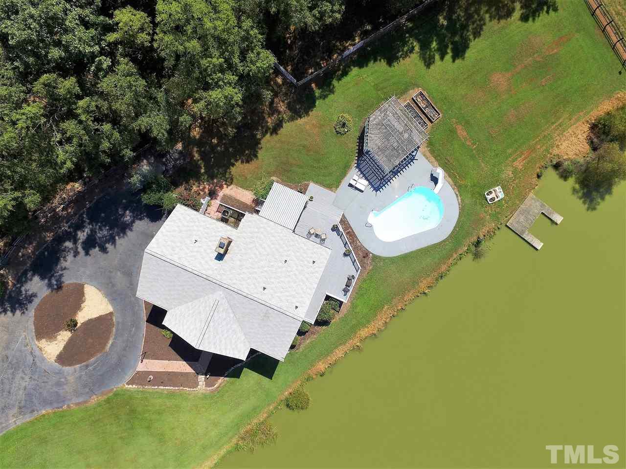 307 Bacon Road Rougemont, NC 27572 - Photo 3 of 25 an aerial view of a house with swimming pool and outdoor space