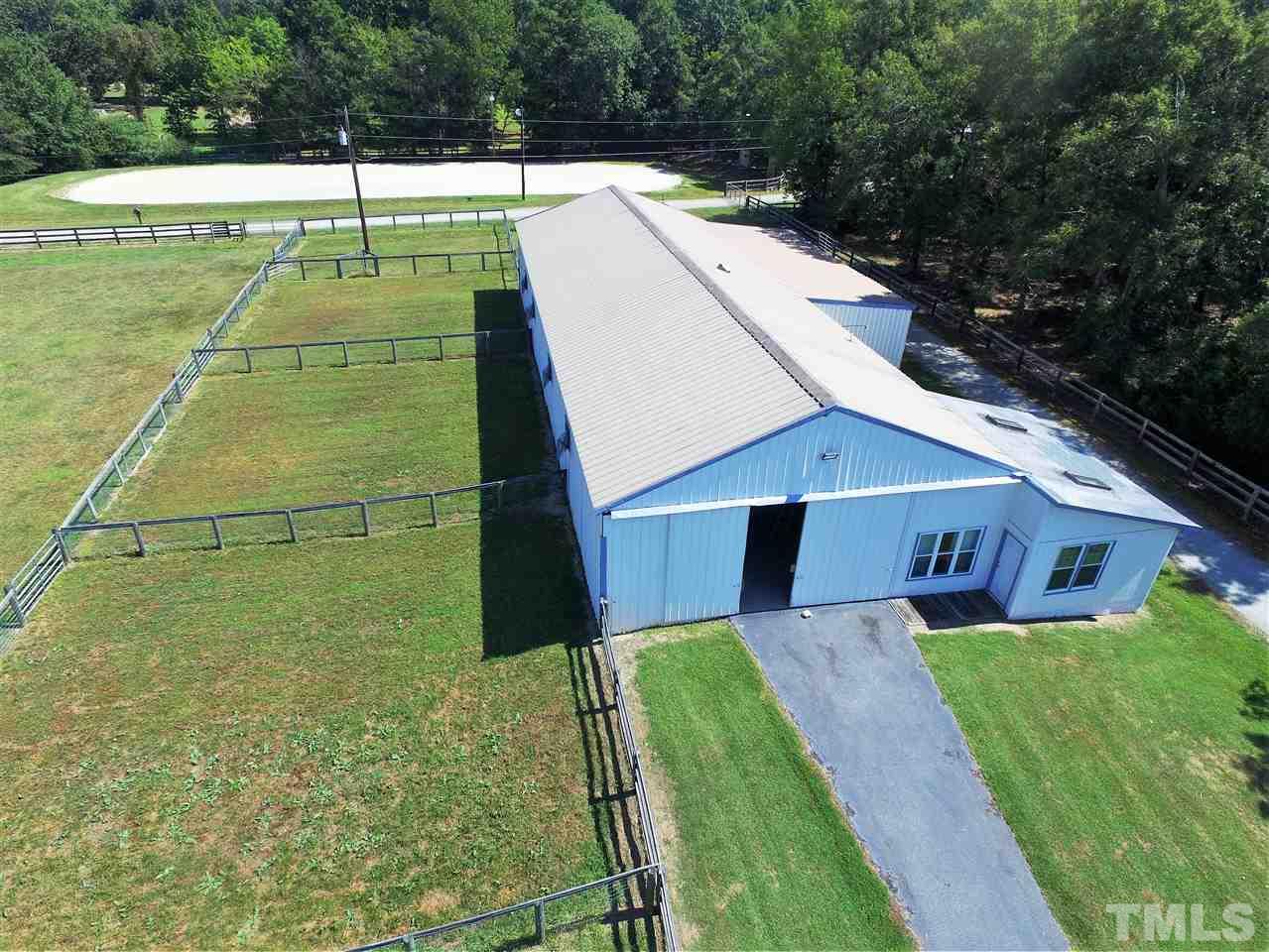 307 Bacon Road Rougemont, NC 27572 - Photo 21 of 25 a view of a back yard of the house