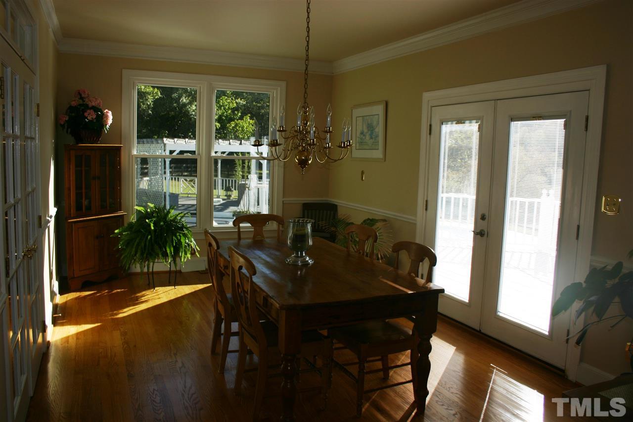 307 Bacon Road Rougemont, NC 27572 - Photo 6 of 25 a view of a dining room with furniture window and outside view