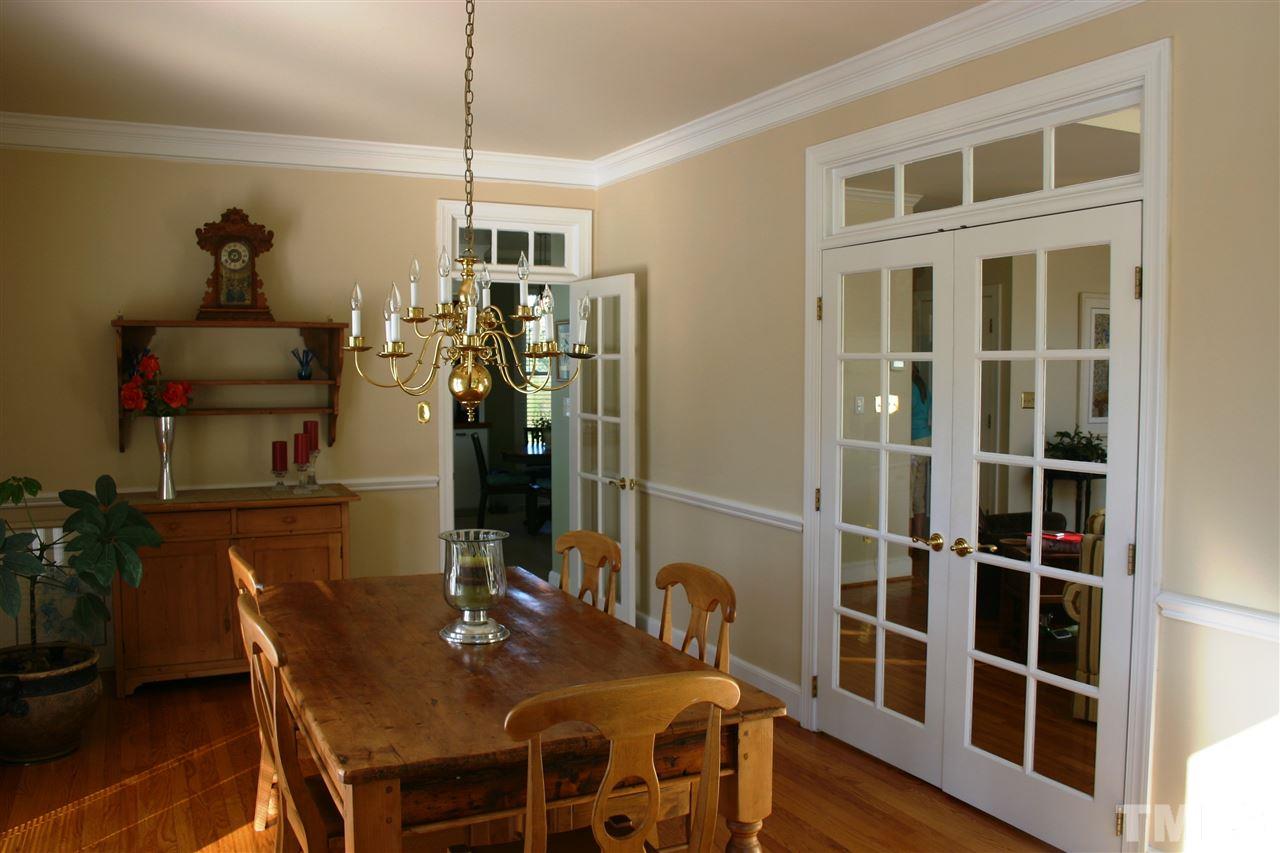 307 Bacon Road Rougemont, NC 27572 - Photo 7 of 25 a view of a dining room with furniture and wooden floor