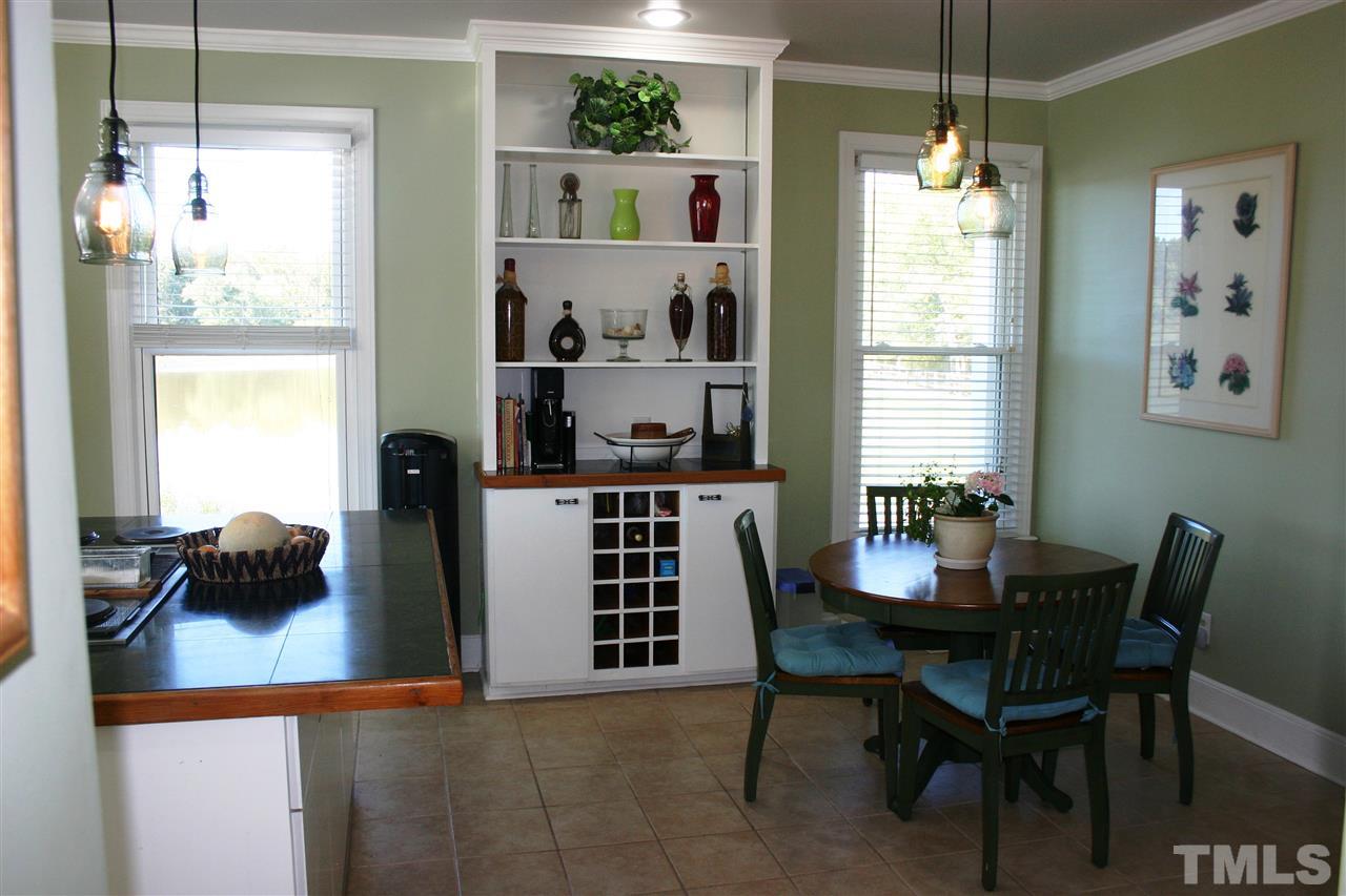 307 Bacon Road Rougemont, NC 27572 - Photo 9 of 25 a dining room with furniture and window
