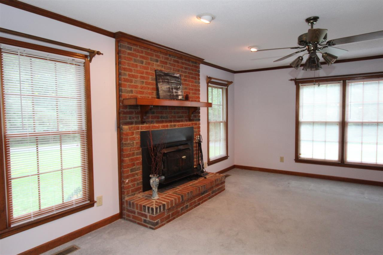 1100 Turner Farms Road Garner, NC 27529 - Photo 5 of 22 Large Family room with Wood burning fireplace and insert. Den/Family/Great Room