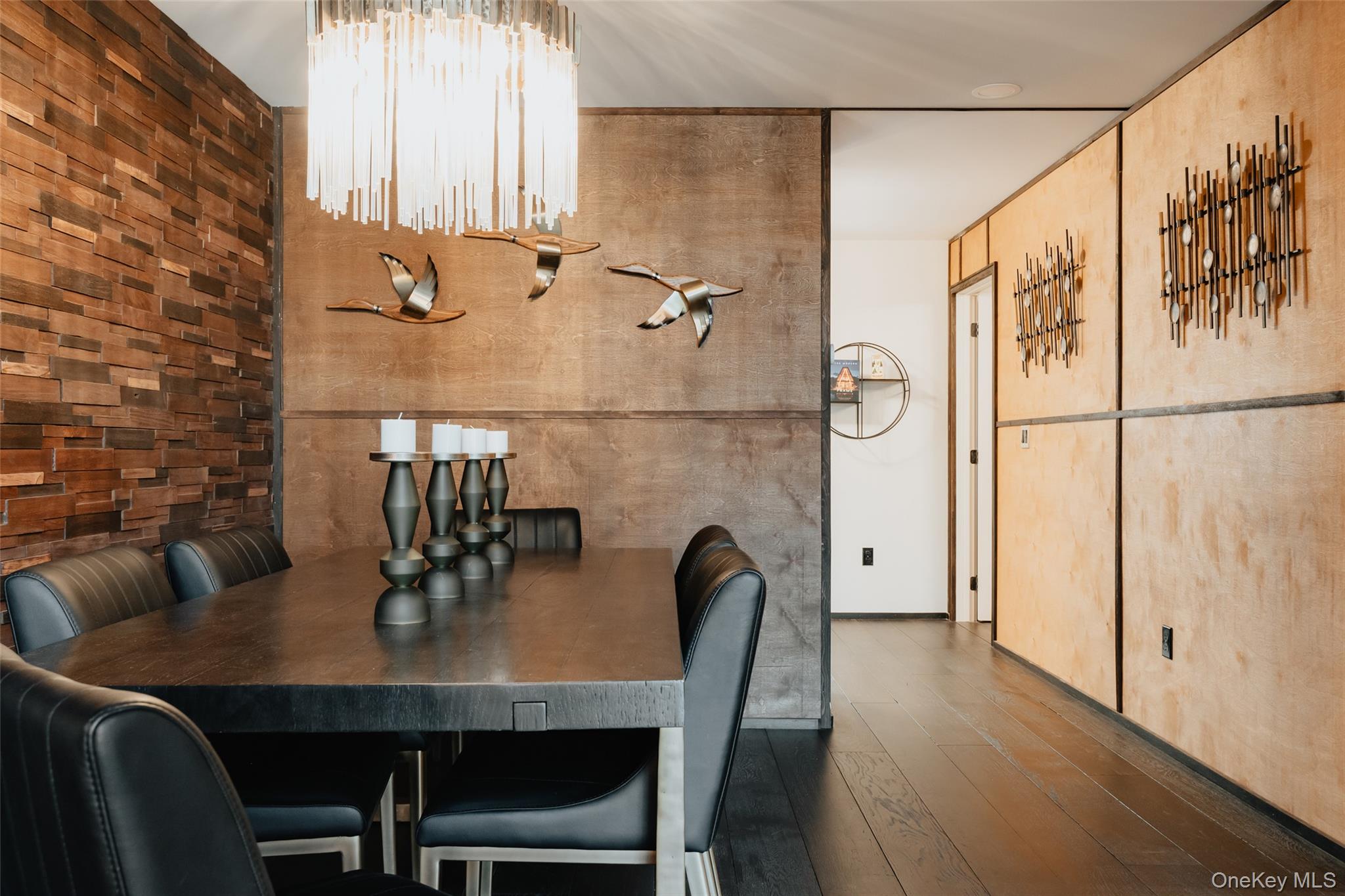 521 Perry Road Swan Lake, NY 12783 - Photo 12 of 32 a view of a dining room with furniture and wooden floor