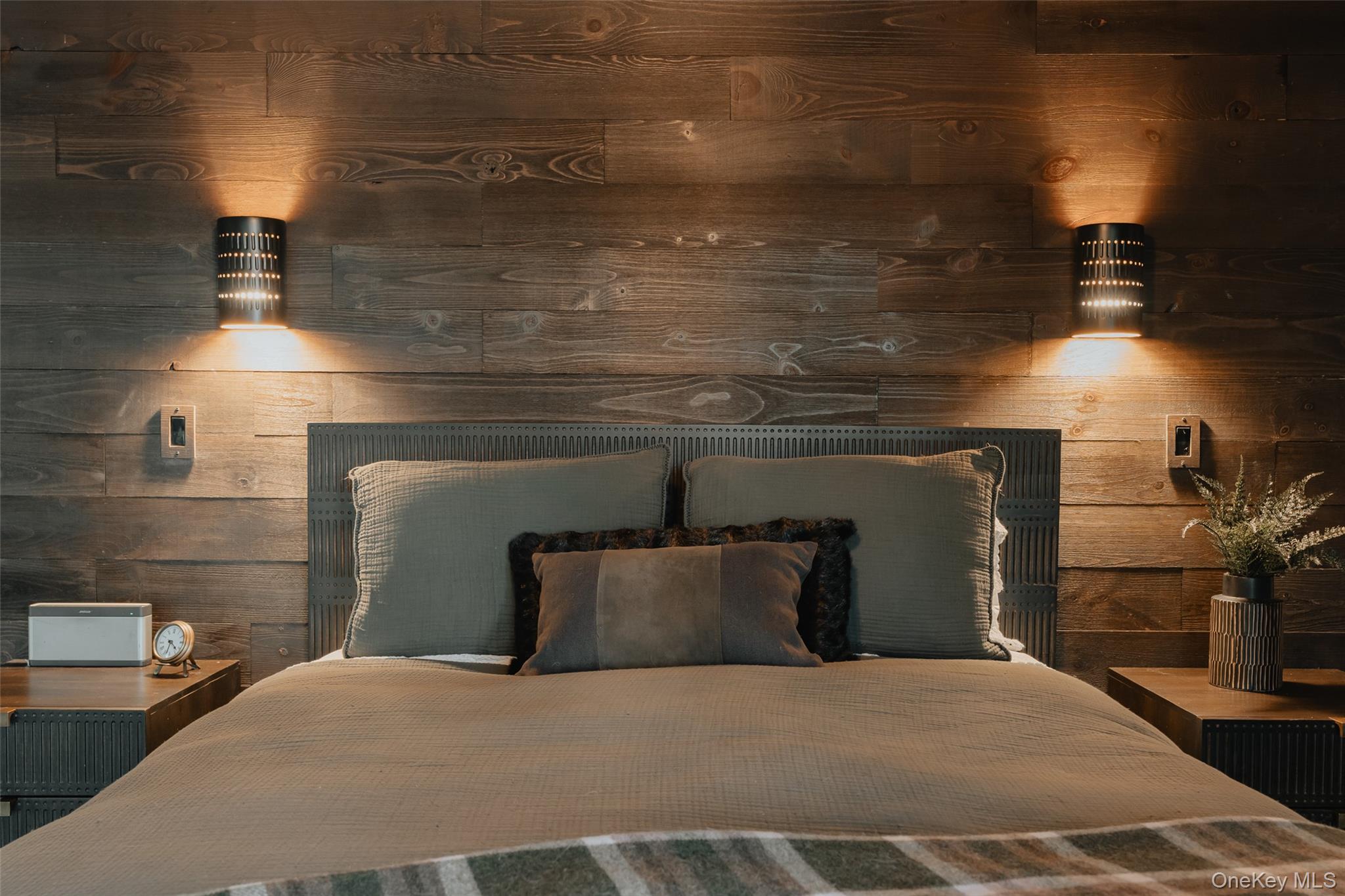 521 Perry Road Swan Lake, NY 12783 - Photo 18 of 32 a bedroom with a bed and a lamp on desk