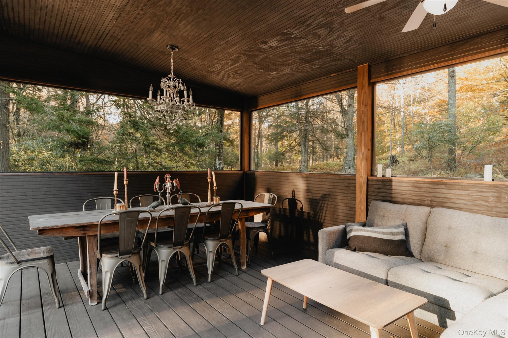 521 Perry Road Swan Lake, NY 12783 - Photo 26 of 32 a living room with furniture and a large window