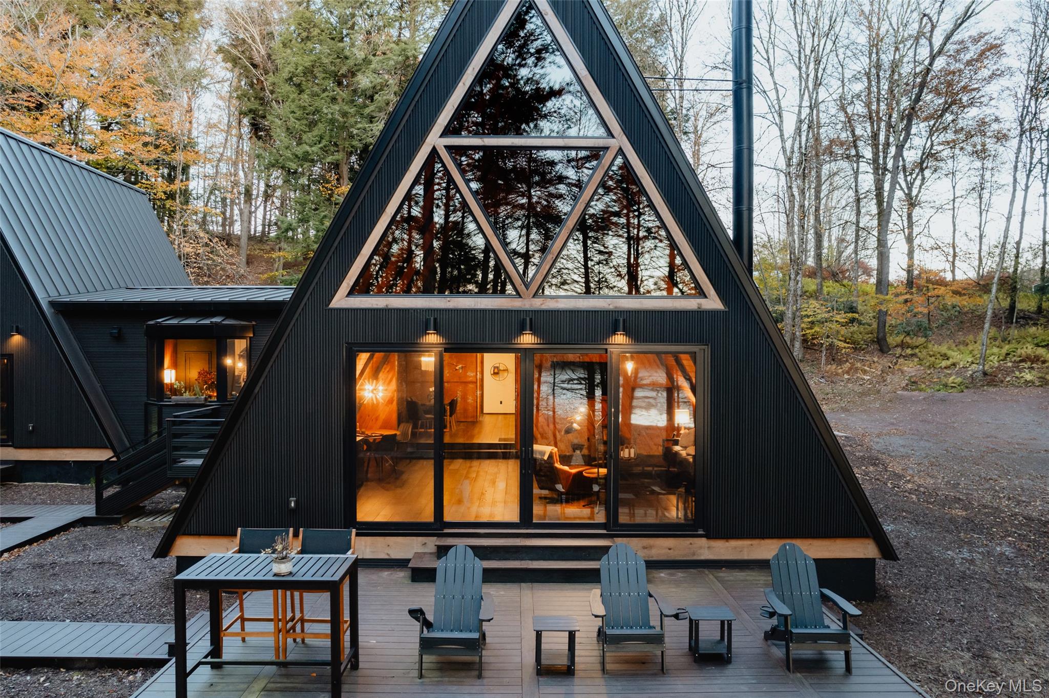 521 Perry Road Swan Lake, NY 12783 - Photo 5 of 32 an outdoor view of house with outdoor seating