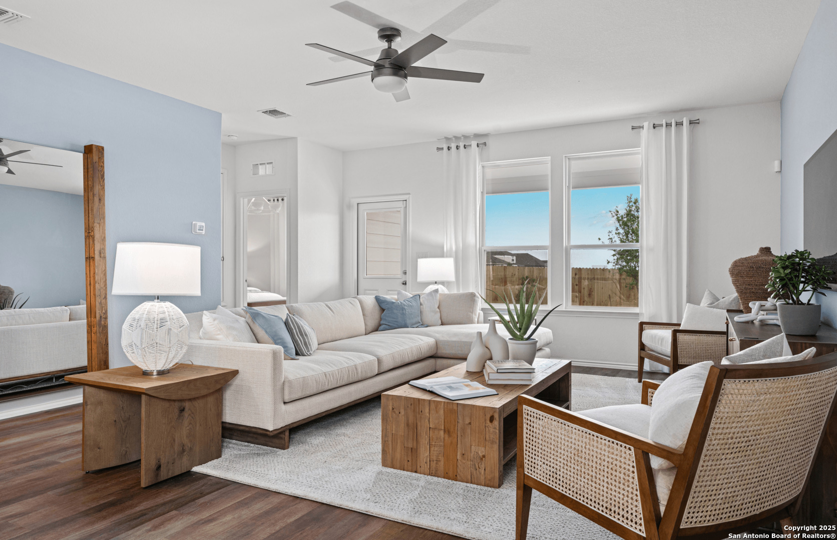 405 Raven Row Marion, TX 78124 - Photo 18 of 25 a living room with furniture and a large window