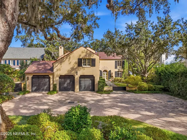 a view of a building with a garden