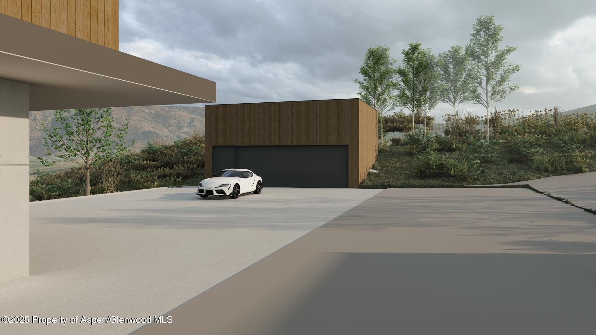 Tbd Lazy O Road Snowmass, CO 81654 - Photo 21 of 44 a car parked on the side of the road