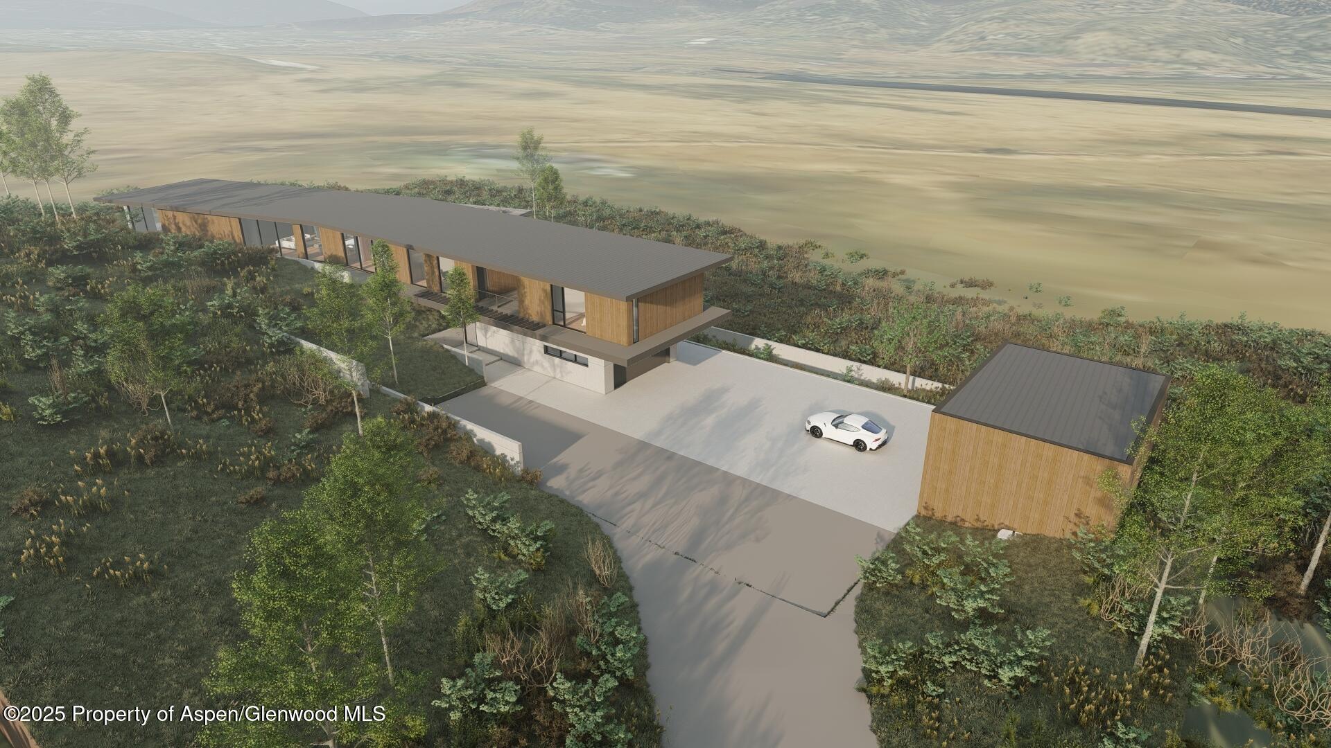 Tbd Lazy O Road Snowmass, CO 81654 - Photo 22 of 44 an aerial view of a house with ocean view