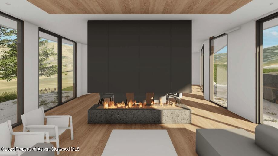 Tbd Lazy O Road Snowmass, CO 81654 - Photo 31 of 44 a living room with furniture and a window