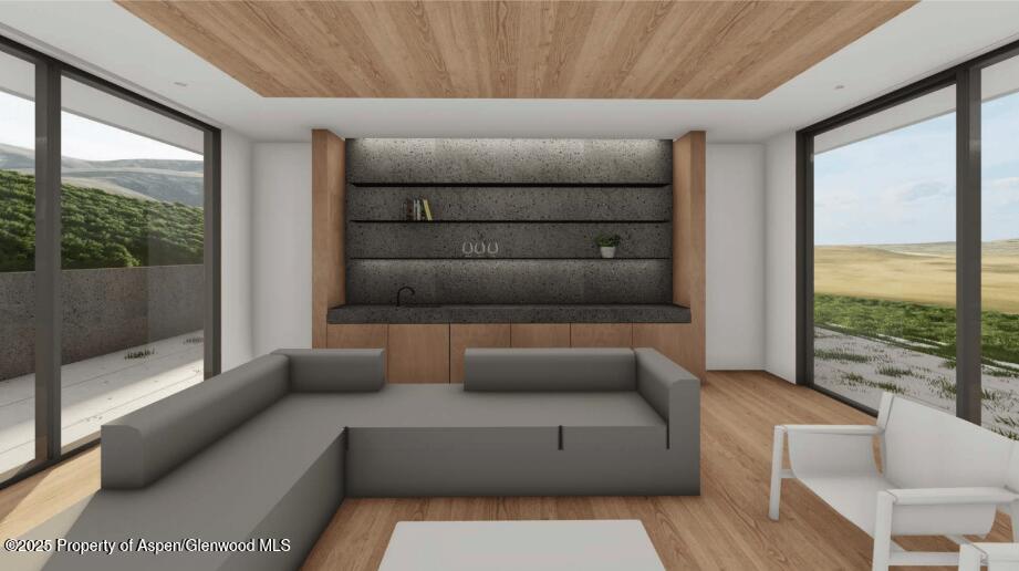 Tbd Lazy O Road Snowmass, CO 81654 - Photo 32 of 44 a living room with furniture and large windows