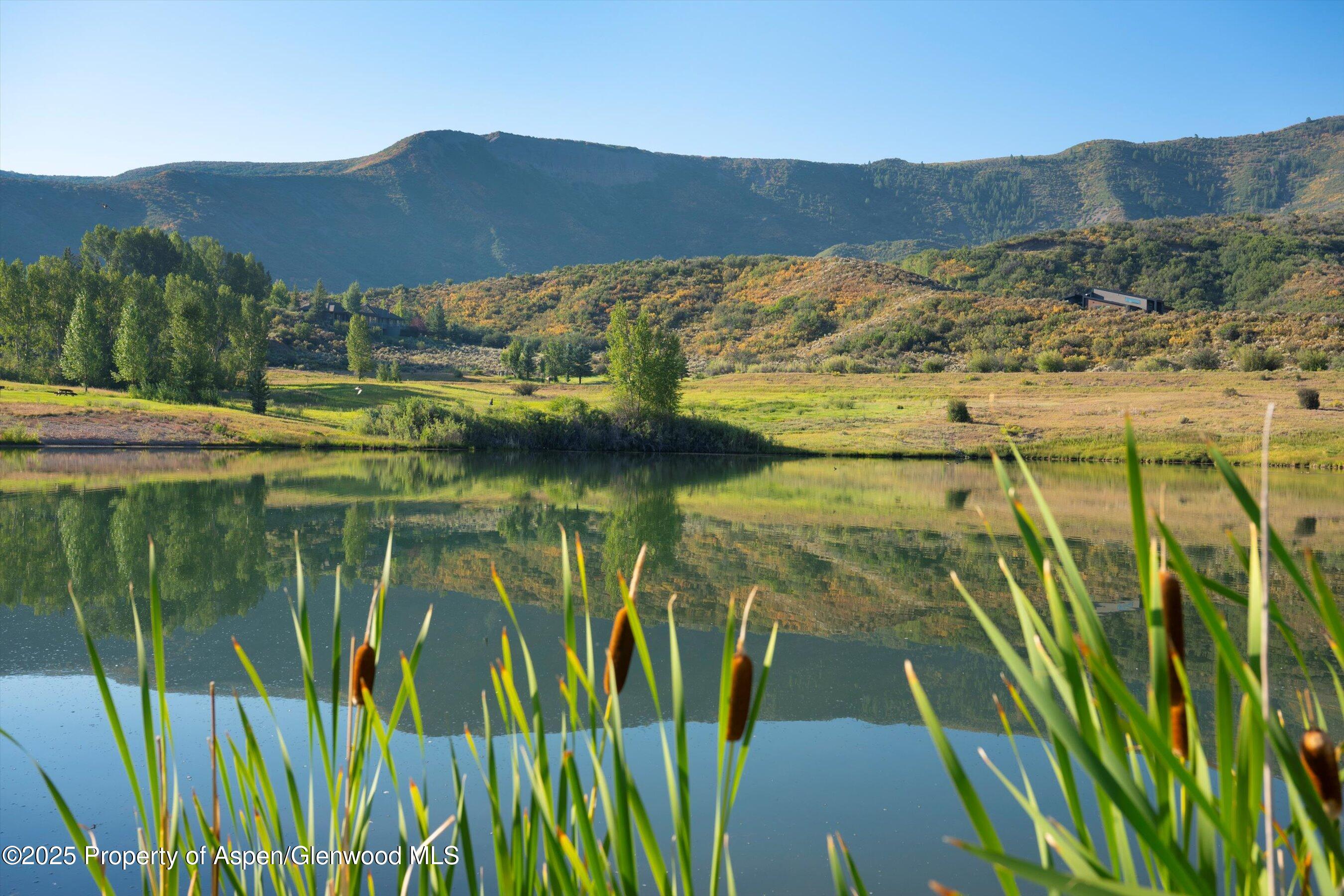 Tbd Lazy O Road Snowmass, CO 81654 - Photo 8 of 44 a view of a lake with a mountain in the background