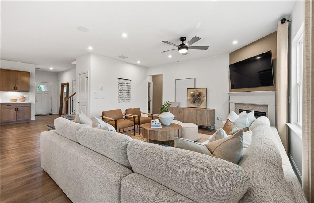 421 Beacon Way Villa Rica, GA 30180 - Photo 11 of 36 a living room with furniture and a flat screen tv