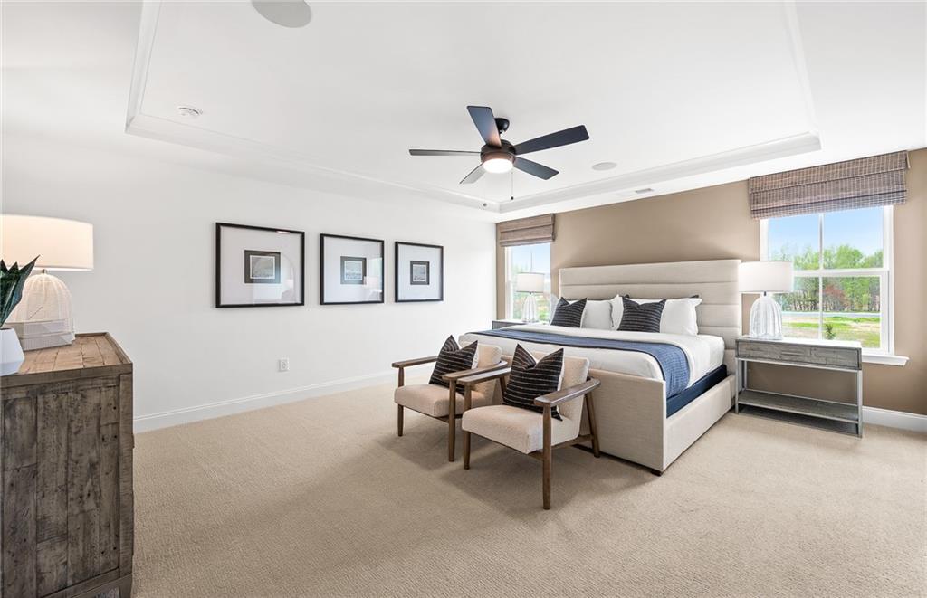 421 Beacon Way Villa Rica, GA 30180 - Photo 22 of 36 a bedroom with a bed and a window