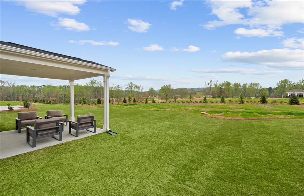 421 Beacon Way Villa Rica, GA 30180 - Photo 35 of 36 a view of a golf course with chairs