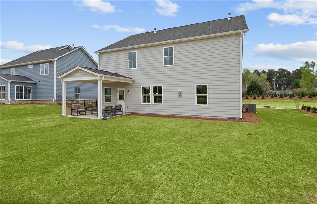 421 Beacon Way Villa Rica, GA 30180 - Photo 36 of 36 a view of a house with a backyard