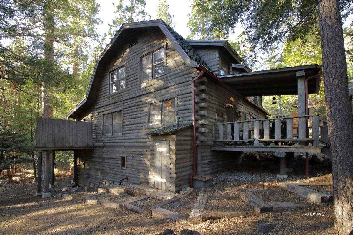 24745 Fern Valley Road Idyllwild, CA 92549 - Photo 1 of 48 a view of a house with a balcony