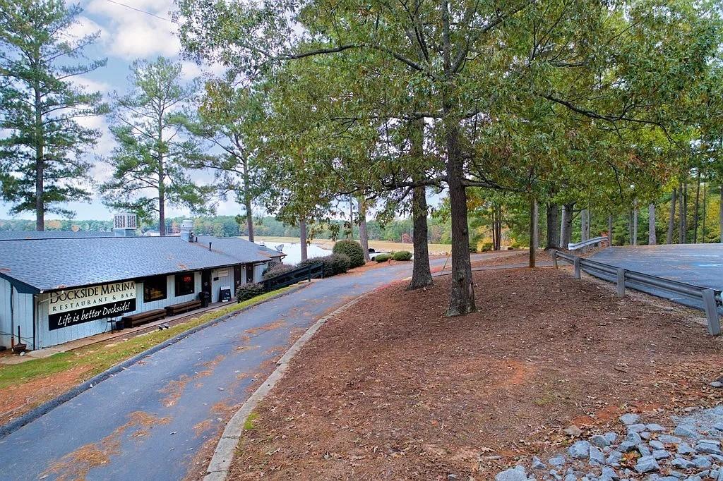 6047 Belle Meade Drive Villa Rica, GA 30180 - Photo 13 of 17 a view of street with houses and trees