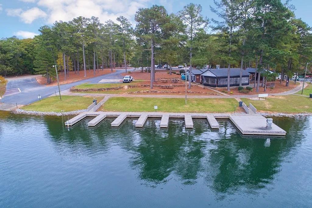 6047 Belle Meade Drive Villa Rica, GA 30180 - Photo 15 of 17 a view of a swimming pool with lounge chairs