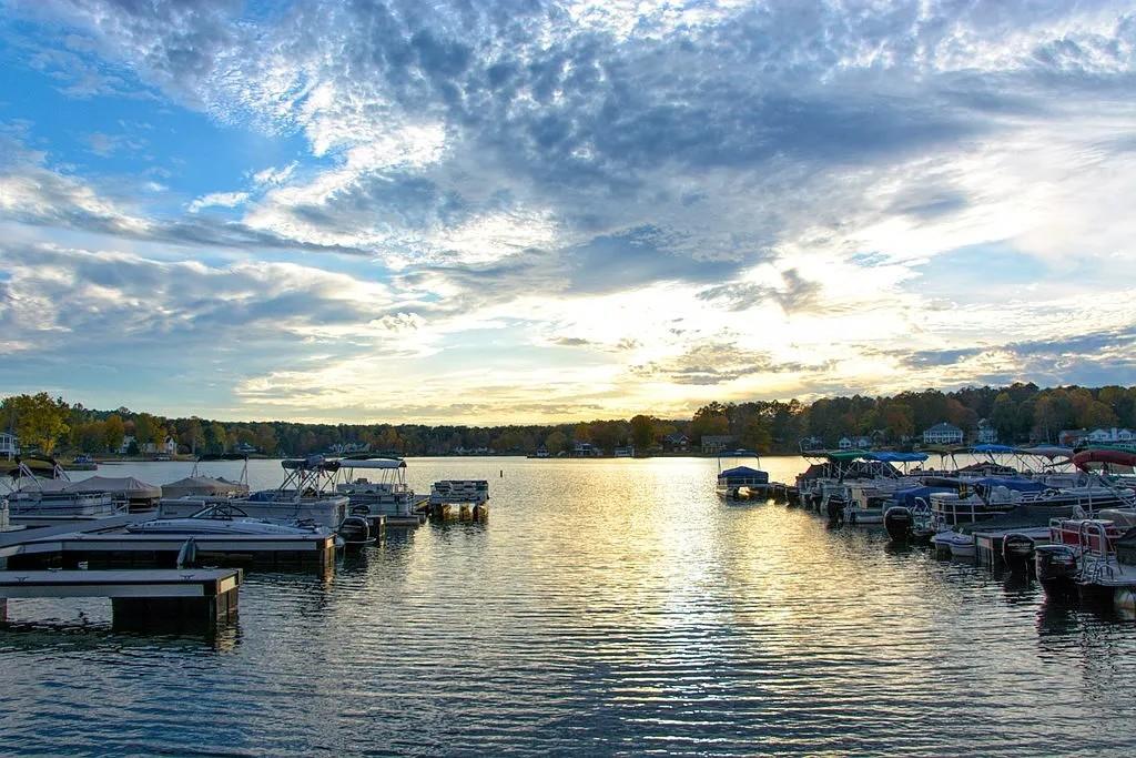 6047 Belle Meade Drive Villa Rica, GA 30180 - Photo 5 of 17 a view of a lake with boats and trees