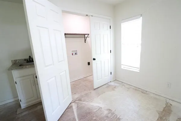 a view of a storage & utility room in a house