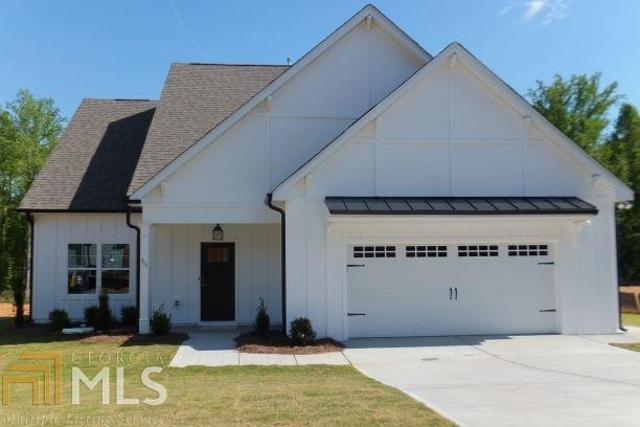 315 S Ridge, Unit 32 Senoia, GA 30276 - Photo 1 of 1 a front view of a house with a yard