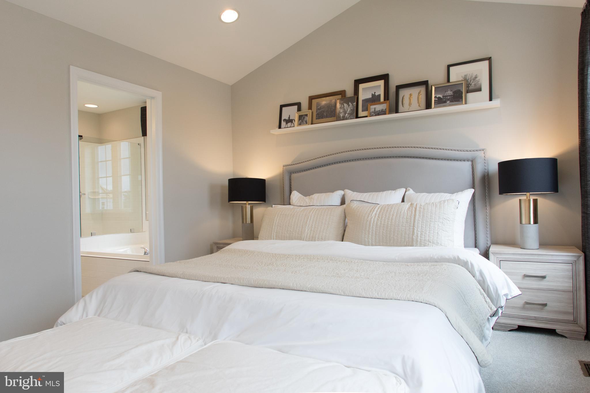 Tbb Tbb Marquee Farm Road, Unit CYPRESS Charles Town, WV 25414 - Photo 11 of 30 a bedroom with a large bed and a window