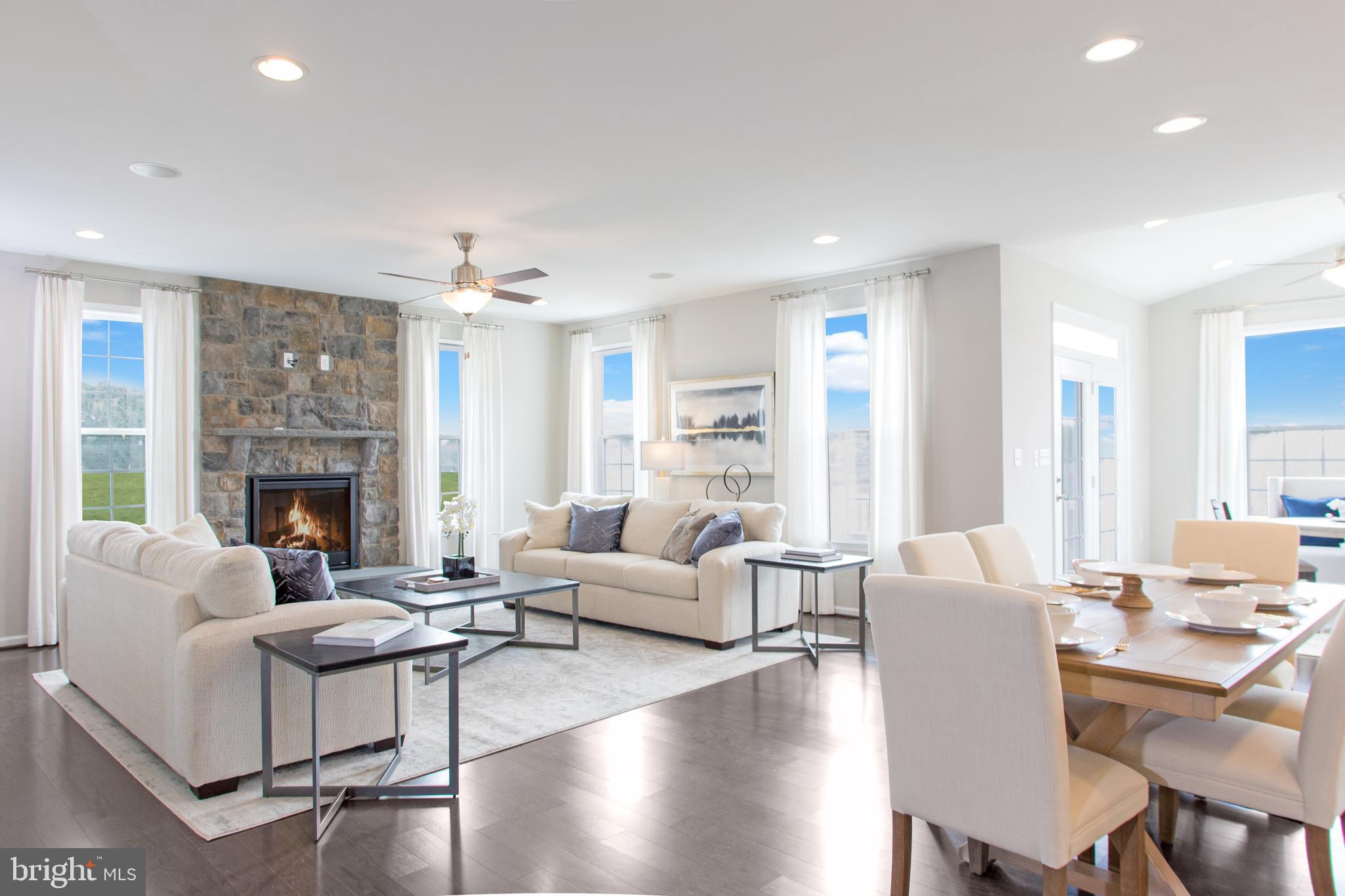 Tbb Tbb Marquee Farm Road, Unit CYPRESS Charles Town, WV 25414 - Photo 5 of 30 a living room with furniture and a fireplace