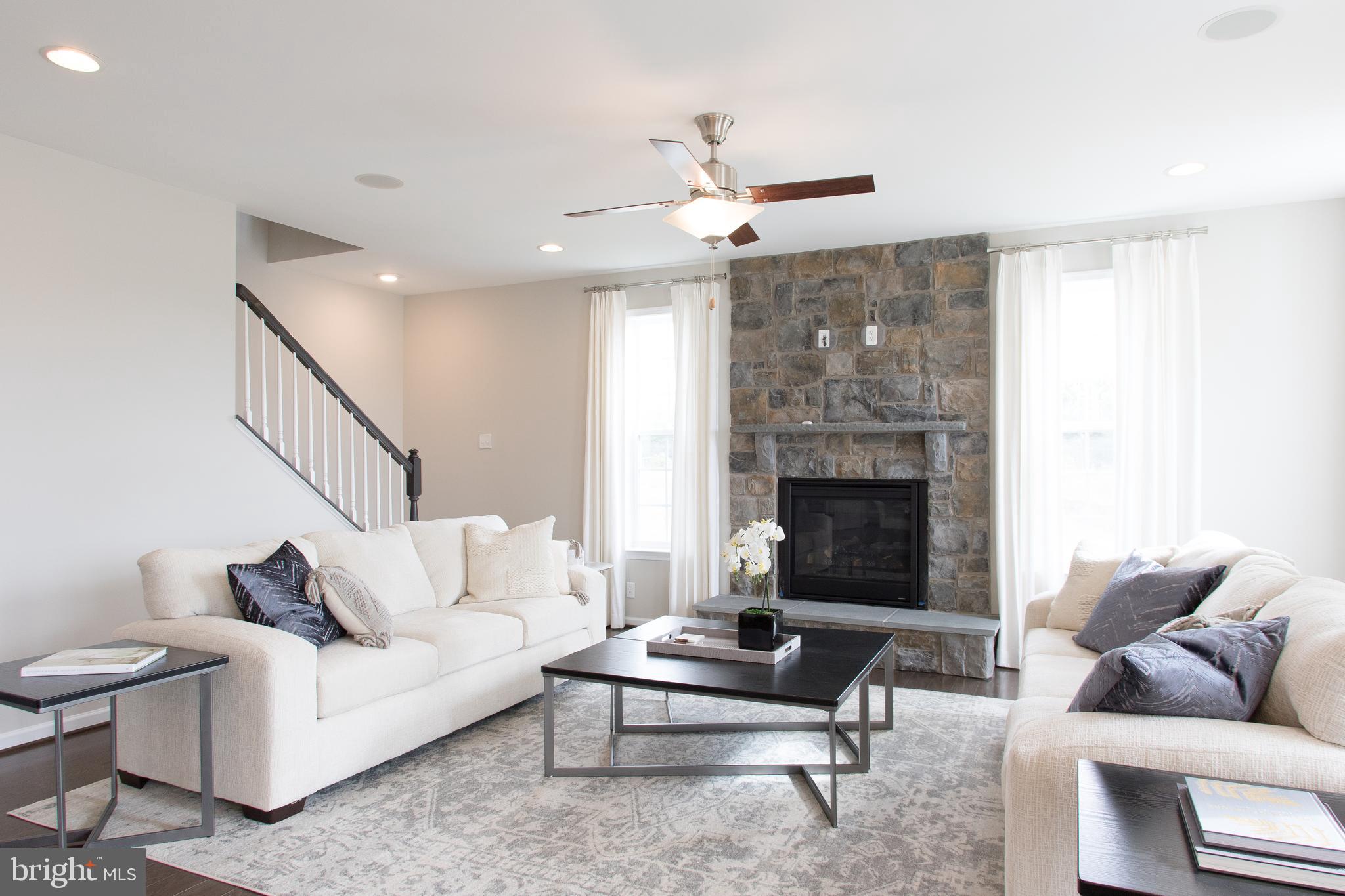 Tbb Tbb Marquee Farm Road, Unit CYPRESS Charles Town, WV 25414 - Photo 6 of 30 a living room with furniture and a fireplace