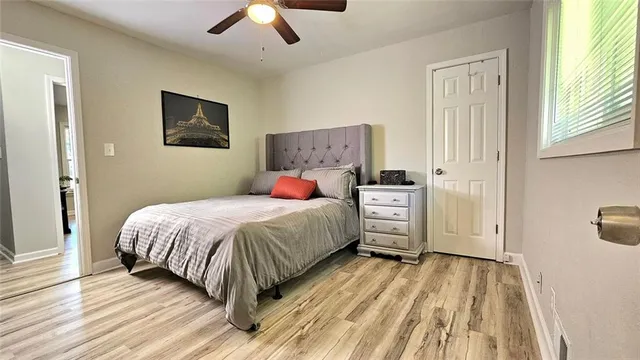 a bathroom with a sink a mirror and shower