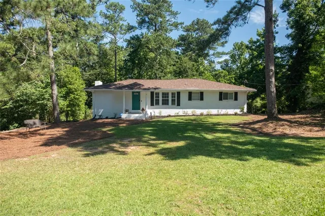 a view of a house with a big yard
