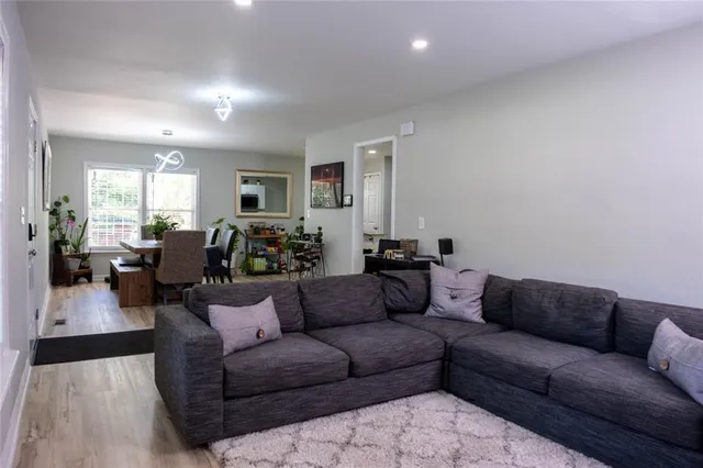 a living room with furniture and a couch