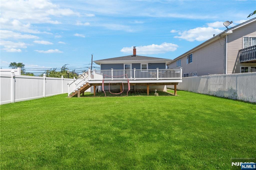 112 Garibaldi Avenue Lodi, NJ 07644 - Photo 21 of 31 a view of a house with a backyard
