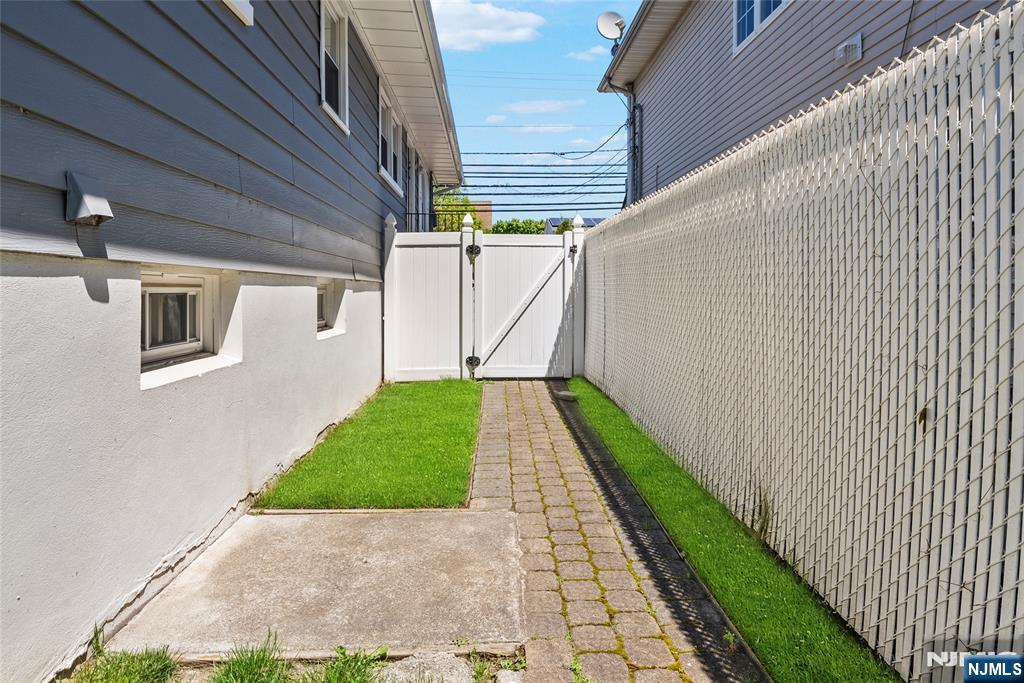 112 Garibaldi Avenue Lodi, NJ 07644 - Photo 24 of 31 a view of back yard of the house