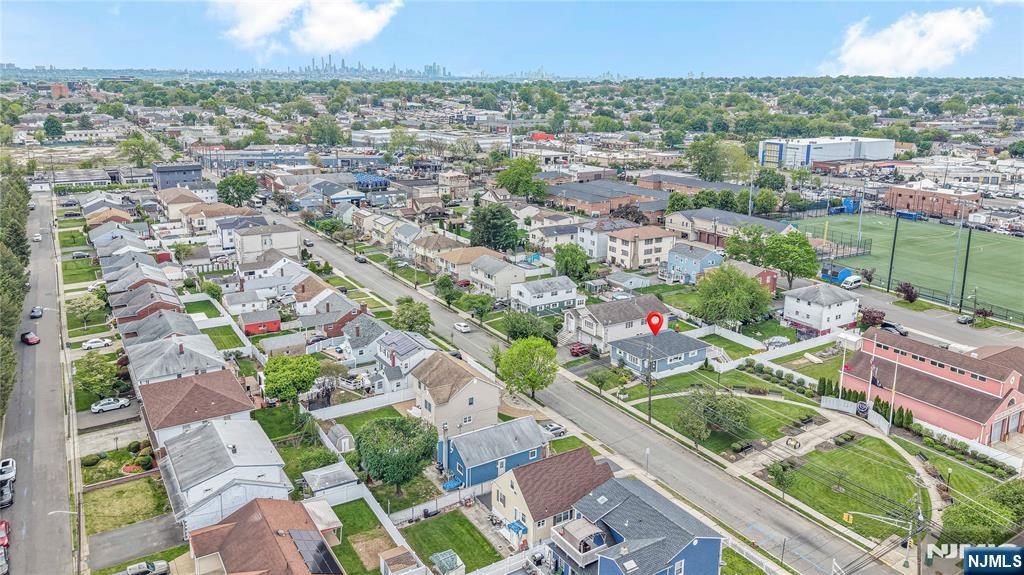 112 Garibaldi Avenue Lodi, NJ 07644 - Photo 26 of 31 an aerial view of residential houses with outdoor space and street view