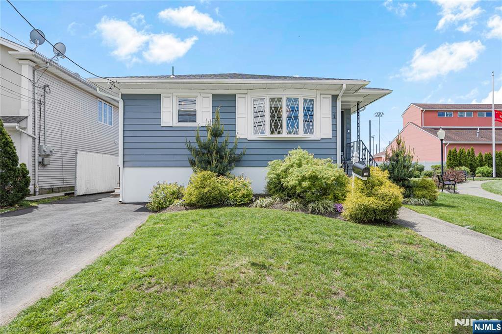 112 Garibaldi Avenue Lodi, NJ 07644 - Photo 29 of 31 a view of a house with a yard