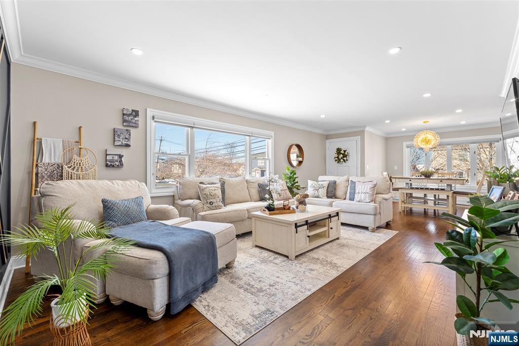 112 Garibaldi Avenue Lodi, NJ 07644 - Photo 3 of 31 a living room with furniture and a large window