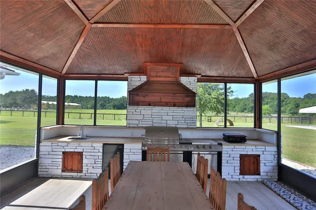 wooden floor to ceiling window and an oven
