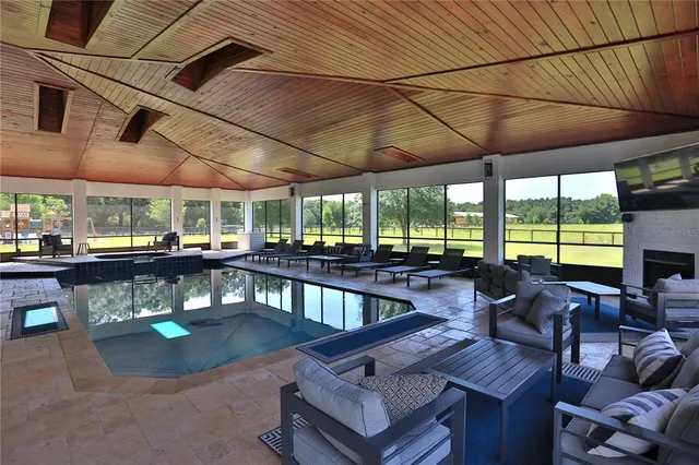 a view of a patio with swimming pool