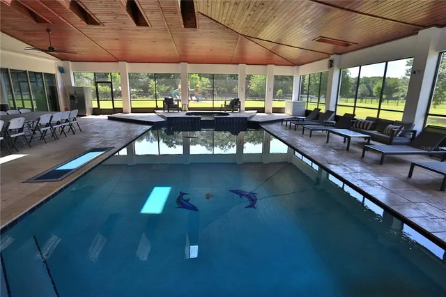 a kitchen with stainless steel appliances kitchen island granite countertop lots of counter top space