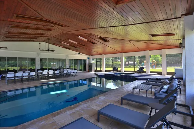a view of a chairs and tables in patio