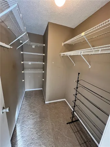 a view of a room with racks on the wall