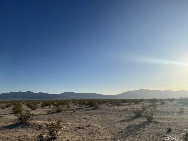 a view of mountain with lake view