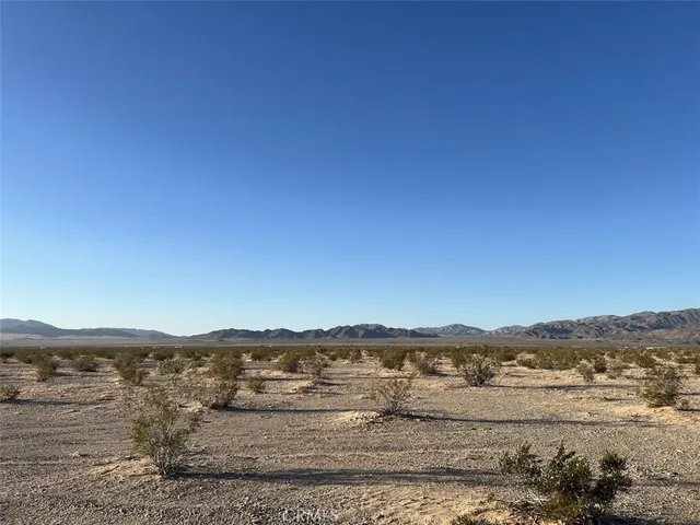 a view of lake and mountain